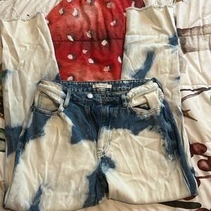 Tie die blue and white jeans with ripped bottoms very cute and not worn a lot